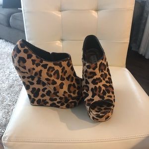8.5 Leopard heels, slightly worn